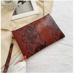 sac pochette cuir python